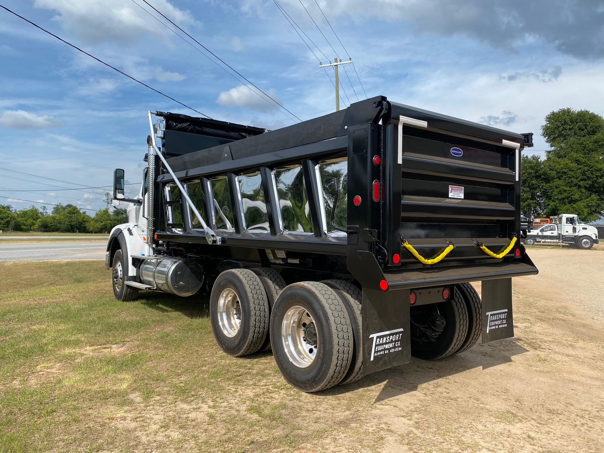 A large dump truck with a black body